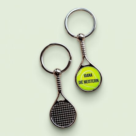 Schlüsselanhänger in Form eines Tennisballs, individuell mit Text bedruckt – Champion
