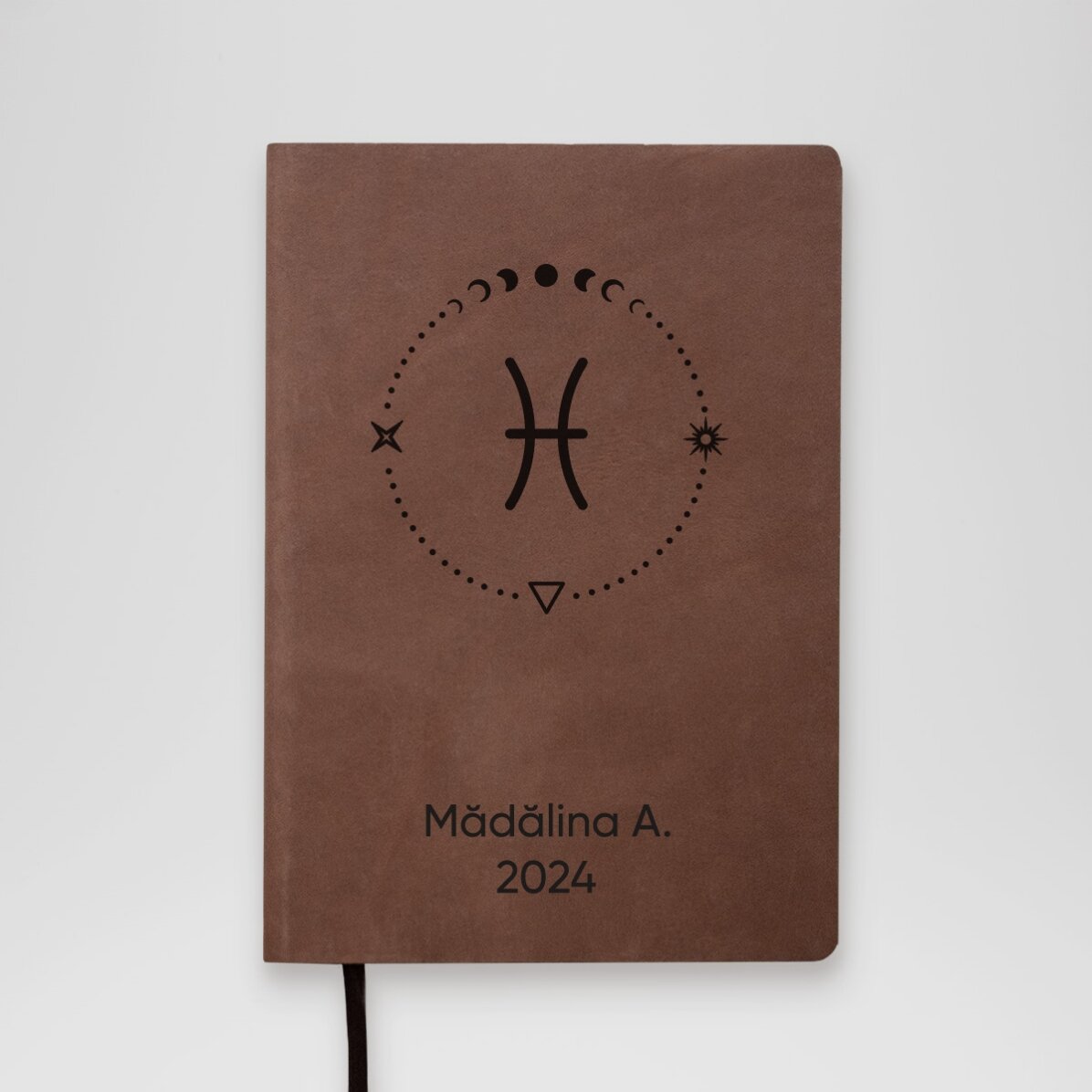 Personalisierter Lederkalender mit Text und dem Sternzeichen Fische