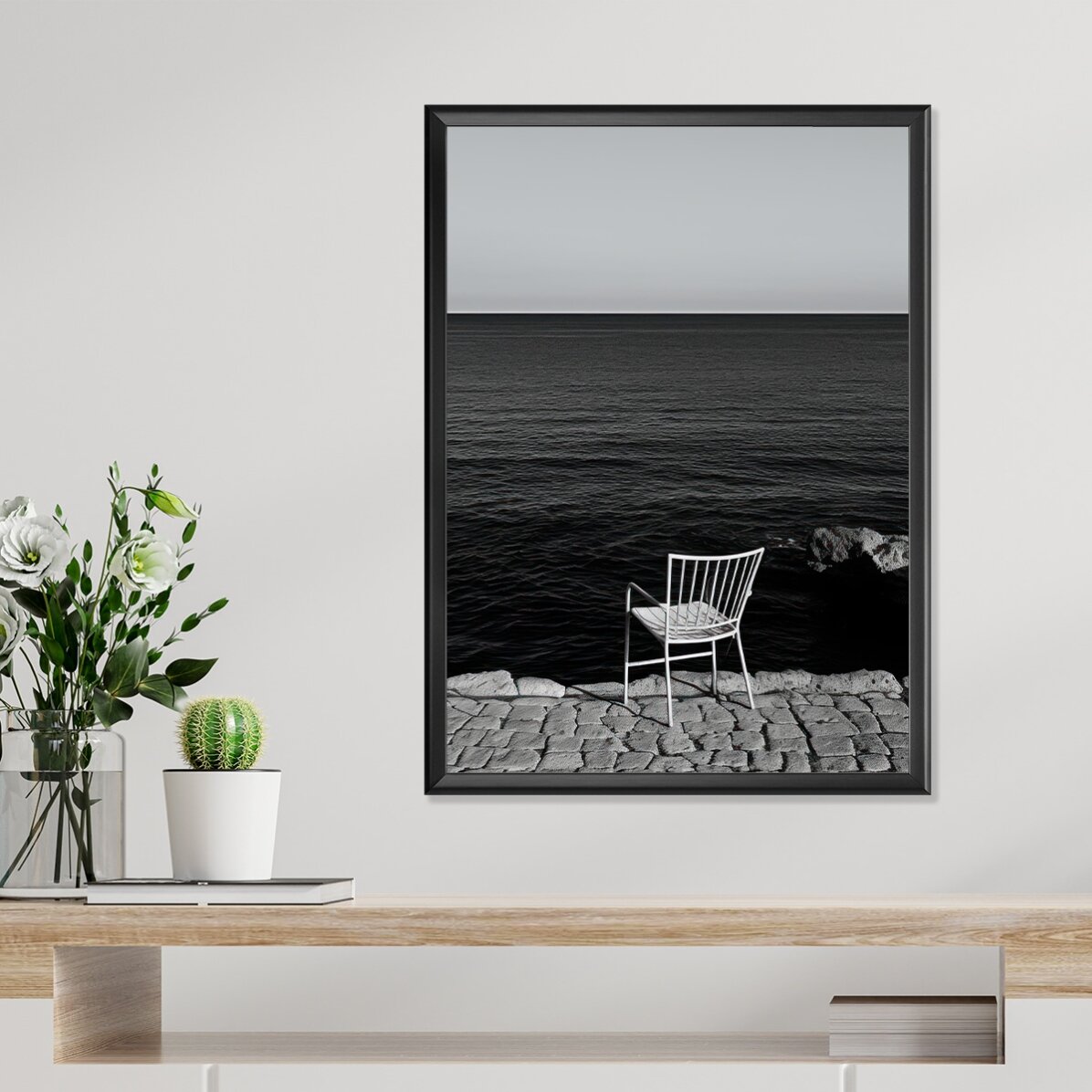 Poster Solitary chair by the sea