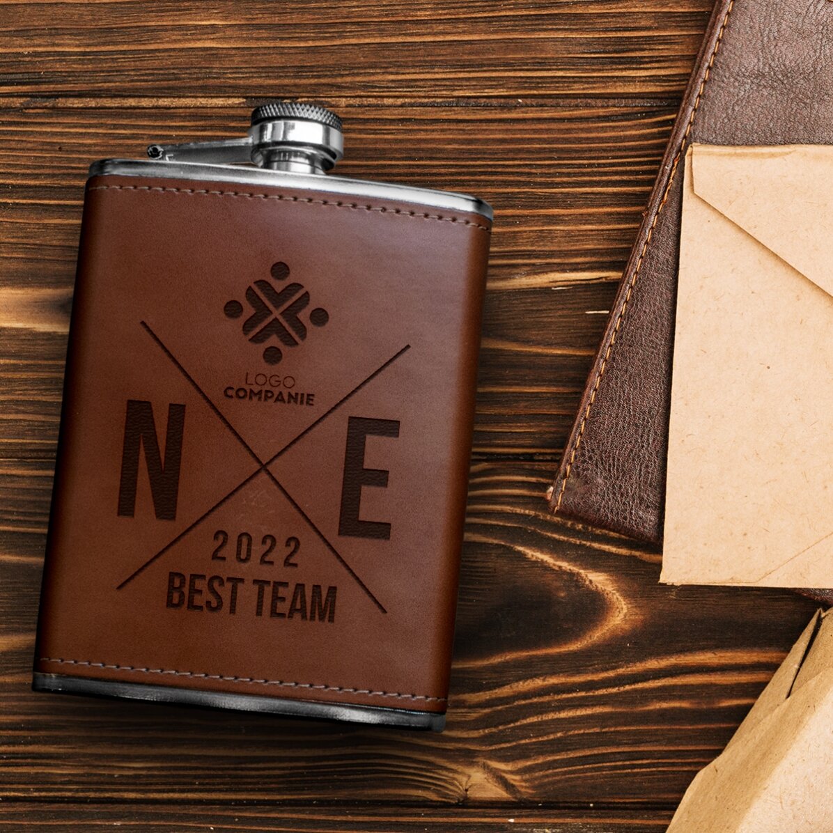 Leather-covered pocket flask personalised with logo and initials