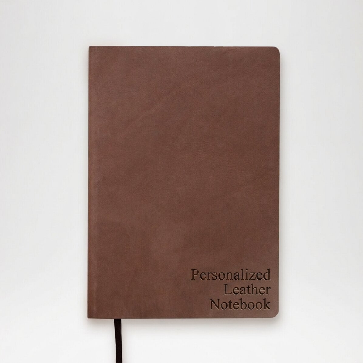Ein personalisiertes Leder-Notizbuch mit deinen Initialen oder deinem Namen