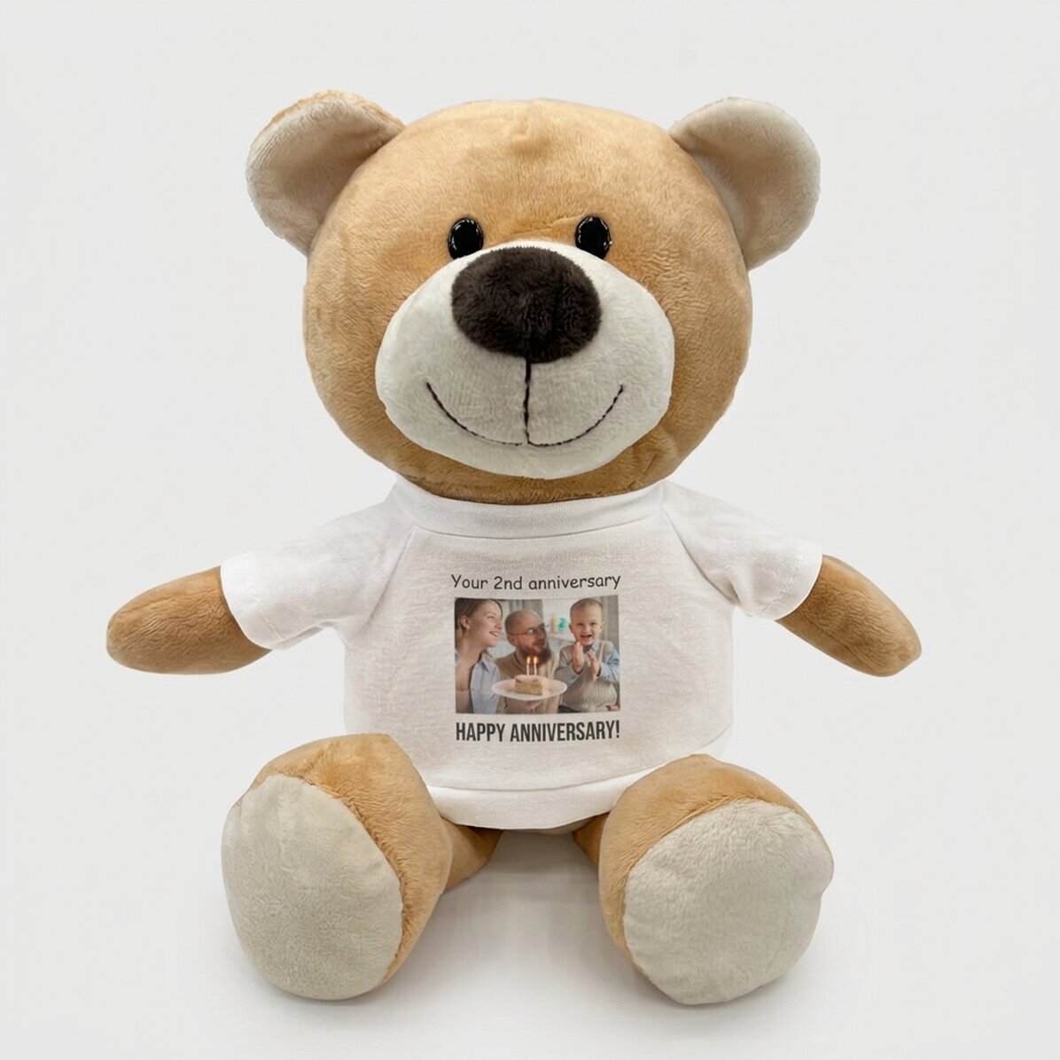 Außerdem ein personalisierter Teddybär mit einem Foto und einem Text