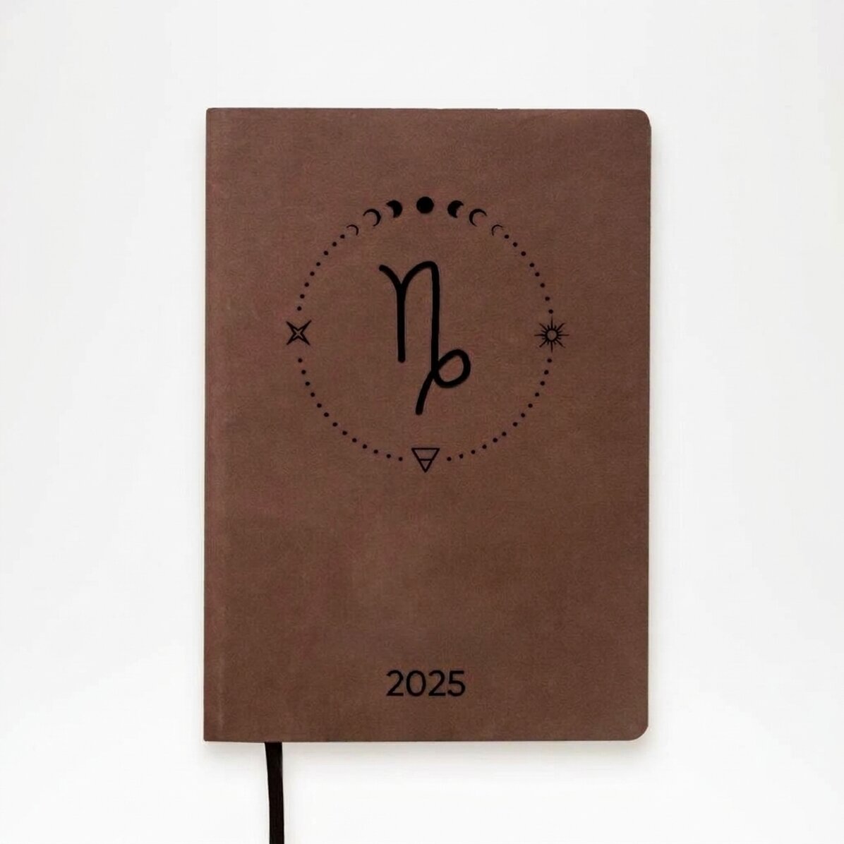 Personalisierter Lederkalender mit Text und dem Sternzeichen Steinbock