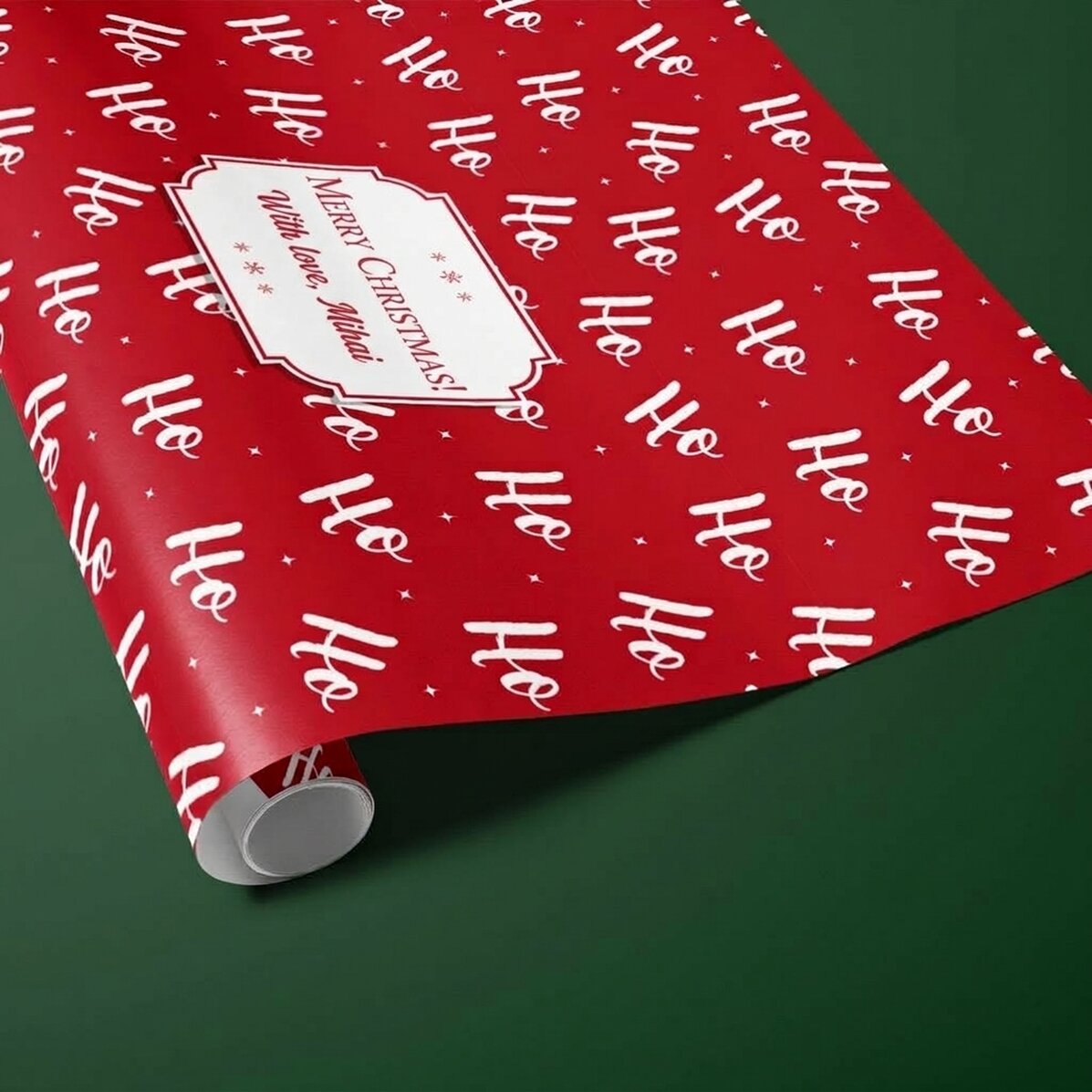 Individuell gestaltetes Geschenkpapier mit Text in einem Rahmen – HoHoHo